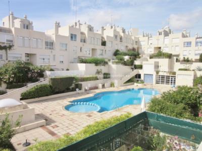 Spacious and bright duplex penthouse with parking spaces and communal swimming pool.